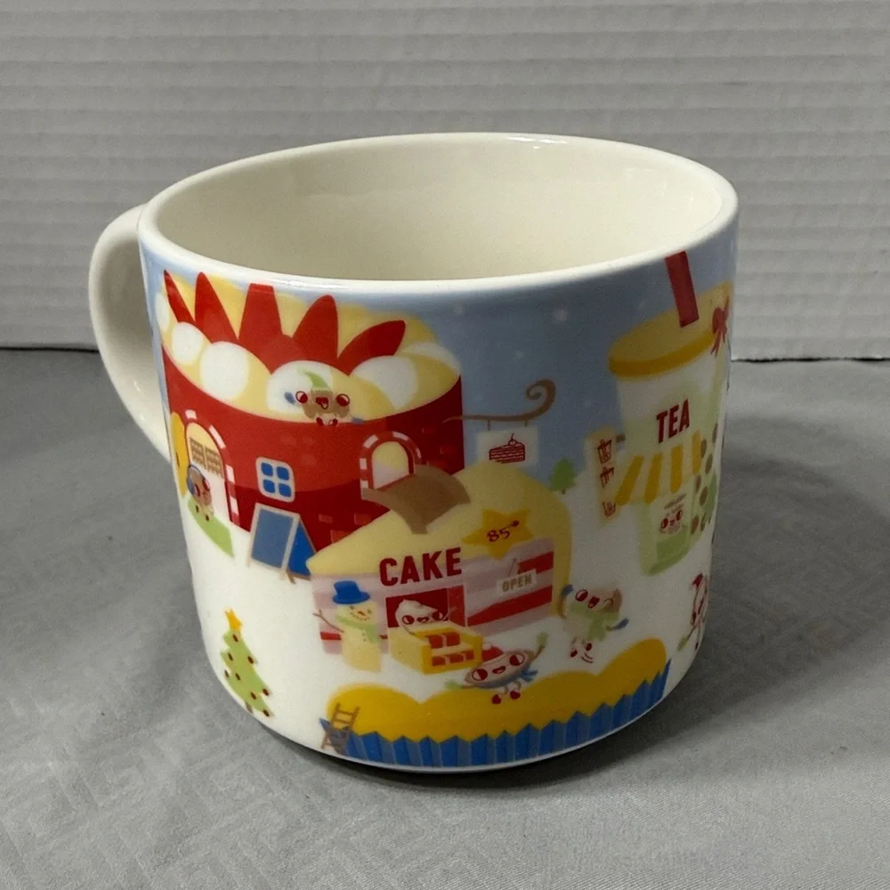 85 Degree Bakery Cafe Collectible Ceramic Mug Cup with Festive Village Design